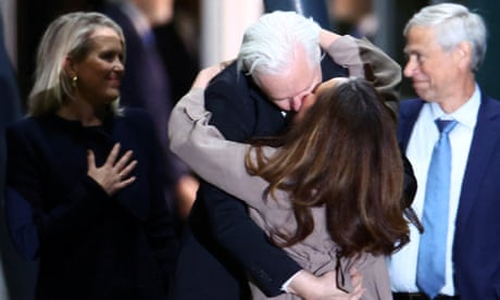 Julian Assange live news: WikiLeaks founder hugs family and salutes supporters as he touches down in Canberra