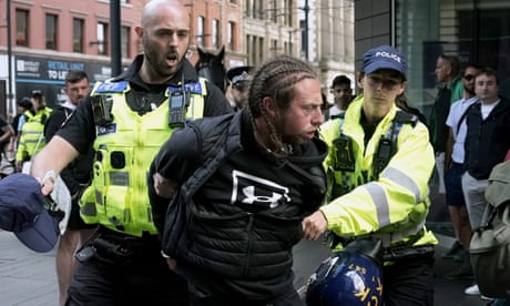 Manchester police issue dispersal order as far right face off with anti-racism protesters – live