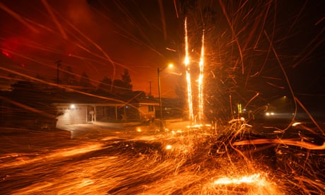 California wildfires live: more than 1,400 firefighters tackling three separate fires around LA